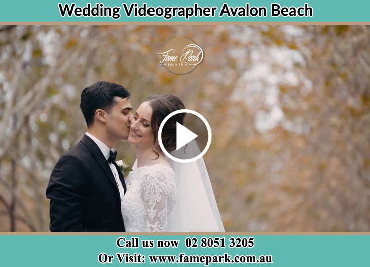 Bride and Groom kissed at the park Avalon Beach NSW 2107