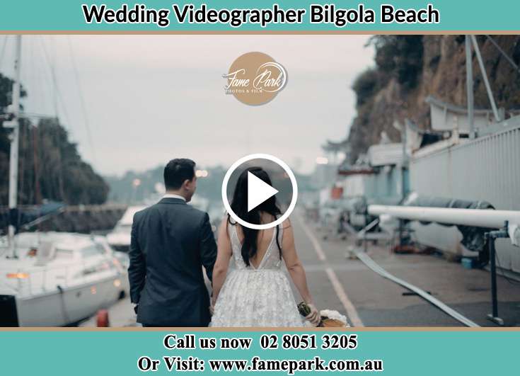 Bride and Groom walking at the harbor Bilgola Beach NSW 2107