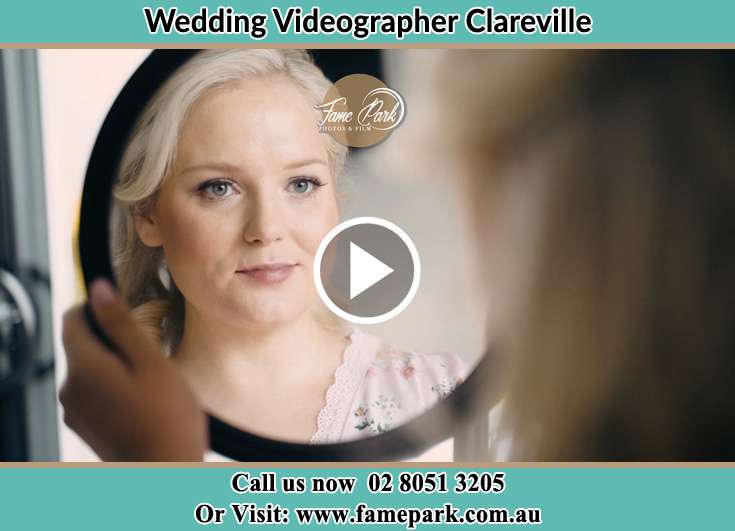 Bride looking at the mirror Clareville NSW 2107