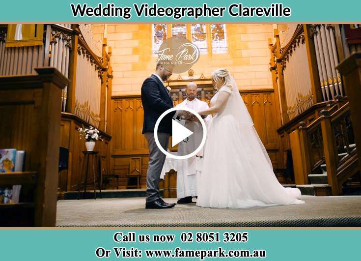 Bride and Groom looking at each other at the altarClareville NSW 2107